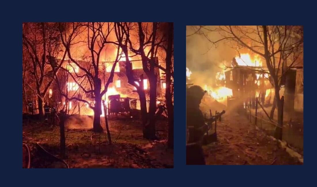 Eskipazar’da 2 katlı ahşap evde çıkan yangın, itfaiye ekiplerince söndürülürken.